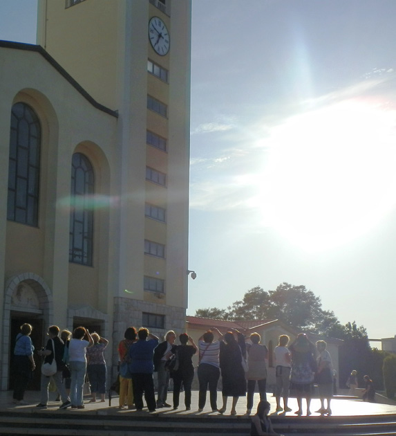 Medjugorje pilgrims apparently looking at a sun miracle